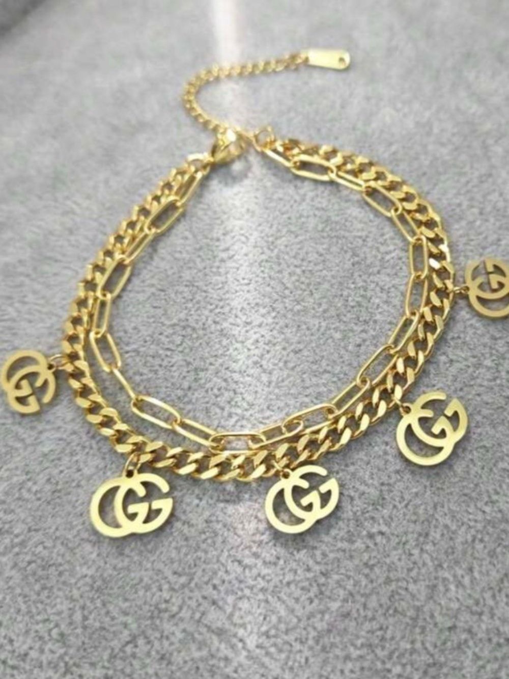 Gold Double-Chain Charm bracelet with Interlocking GG Pendants